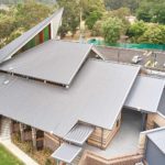 Custom design details on metal roofing on a large church in Kenthurst NSW